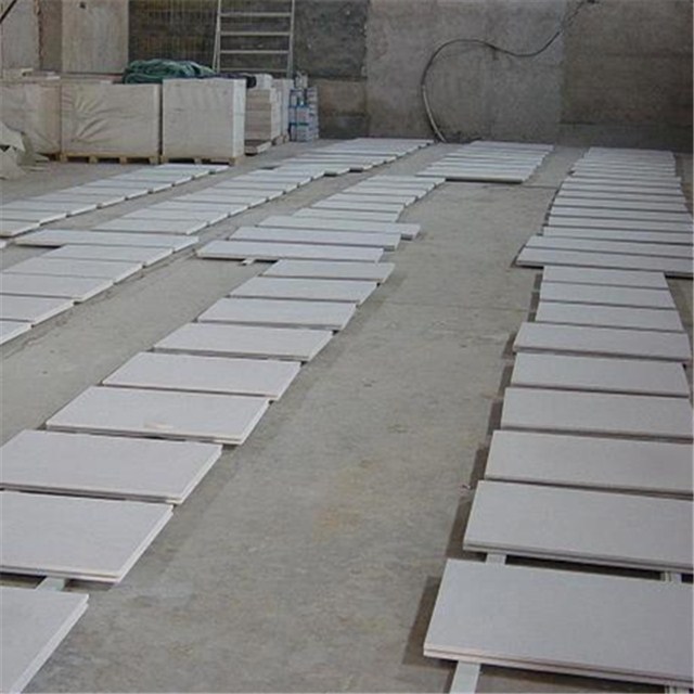 white sandstone wall panels